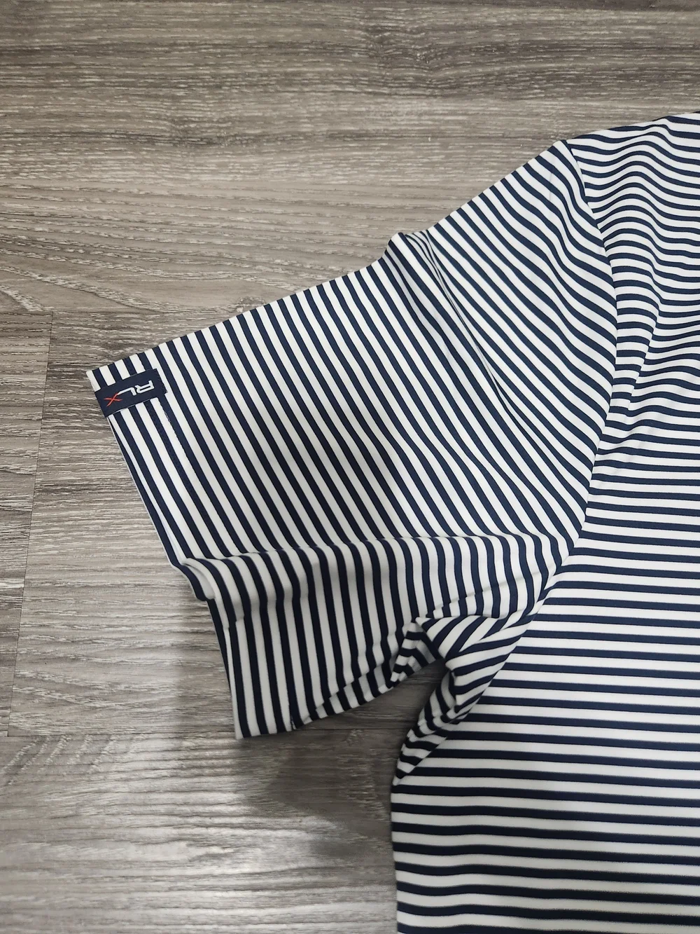 RLX Ralph Lauren Men’s Navy and White Striped Polo Shirt